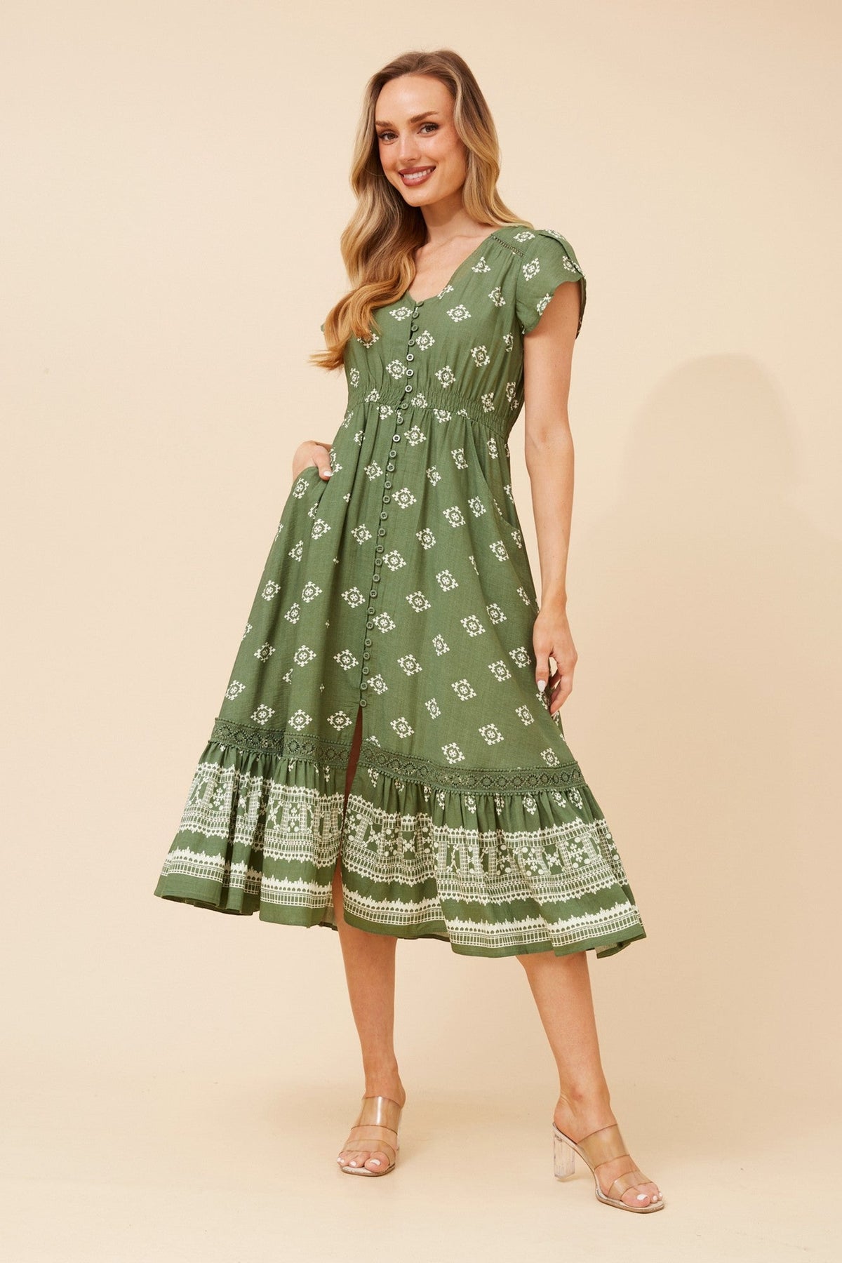 Image of Dresses. Product name - MOROCCO BORDER PRINT MIDI DRESS in Sage colour by brand - Caroline Morgan Australia