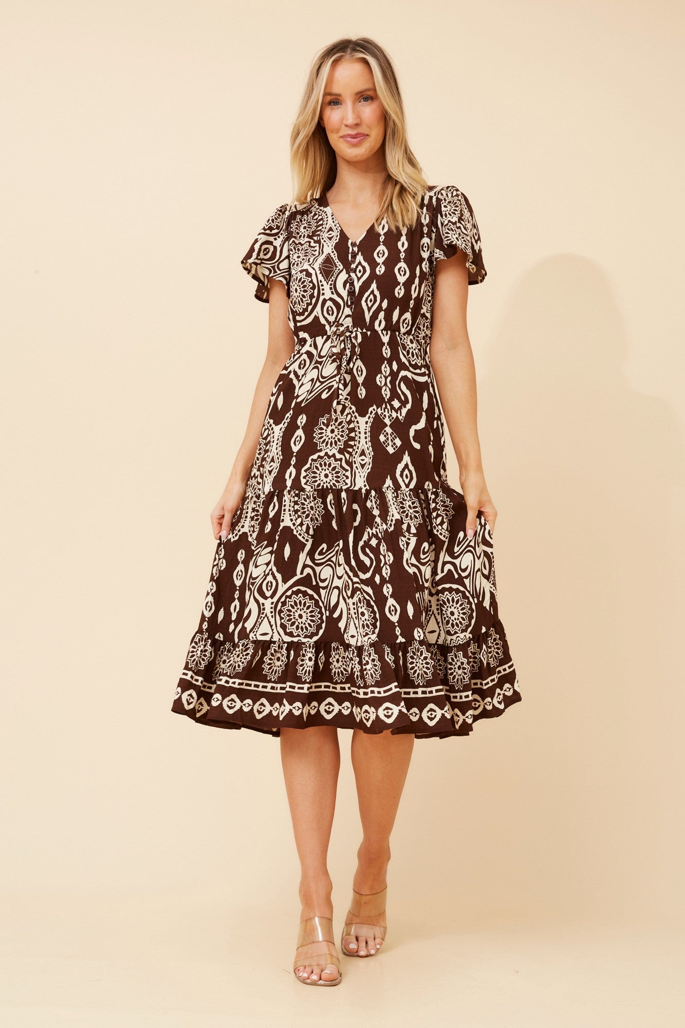 Image of Dresses. Product name - MARI BORDER PRINT MIDI DRESS in Dark Coffee colour by brand - Caroline Morgan Australia