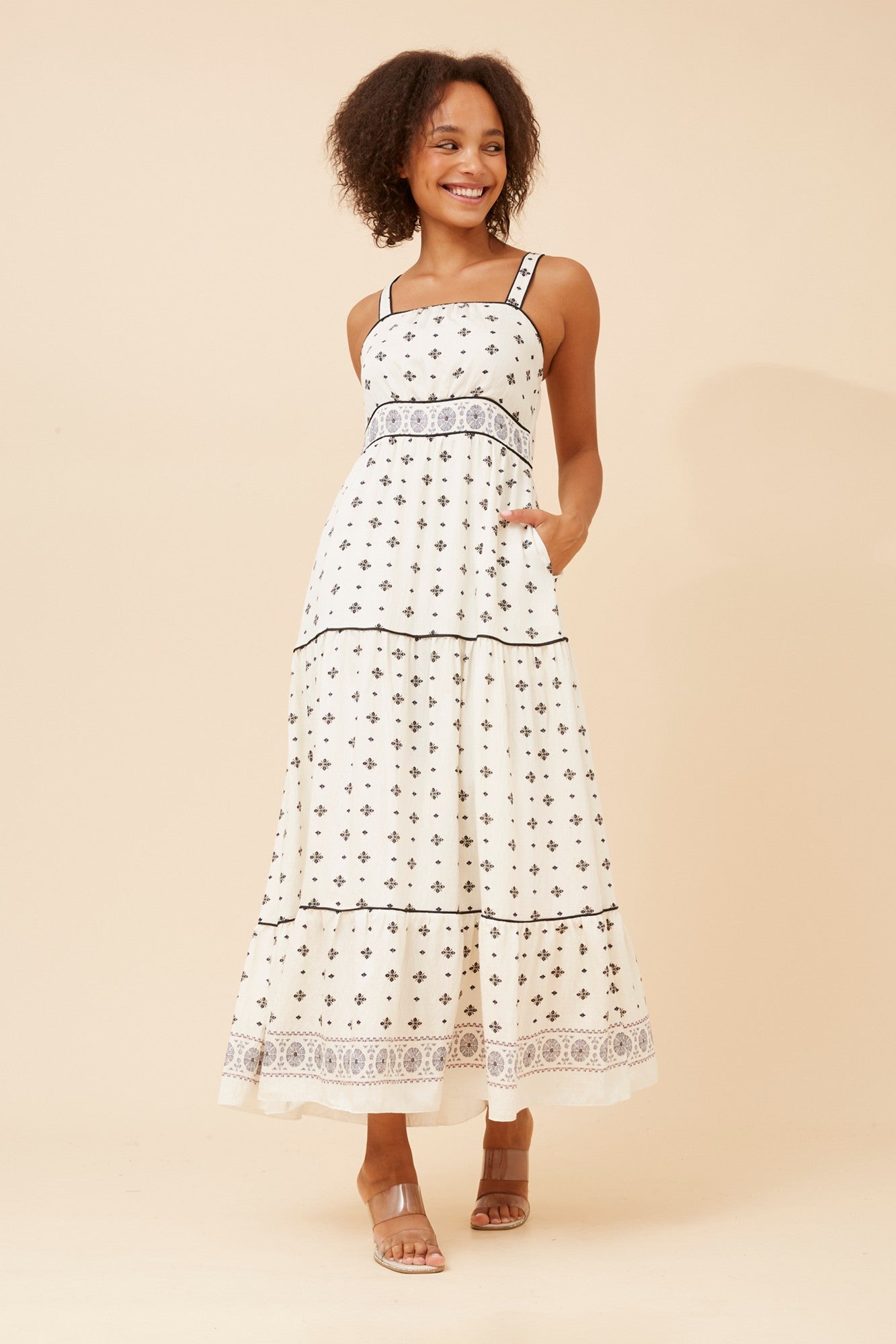 Image of Dresses. Product name - MAVES BORDER PRINT DRESS in White And Black colour by brand - Caroline Morgan Australia