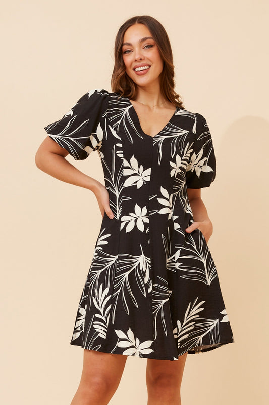 Image of Dresses. Product name - NILA LEAF PRINT SHORT DRESS in Black colour by brand - Caroline Morgan Australia