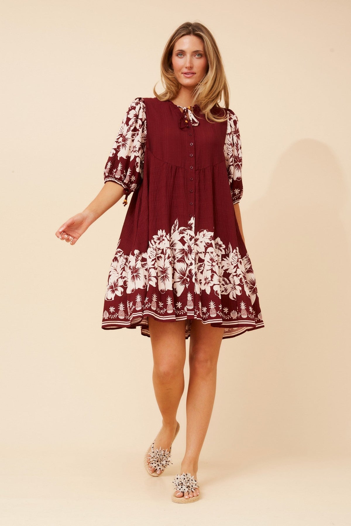 Image of Dresses. Product name - JAVANA BORDER PRINT DRESS in Burgundy colour by brand - Caroline Morgan Australia