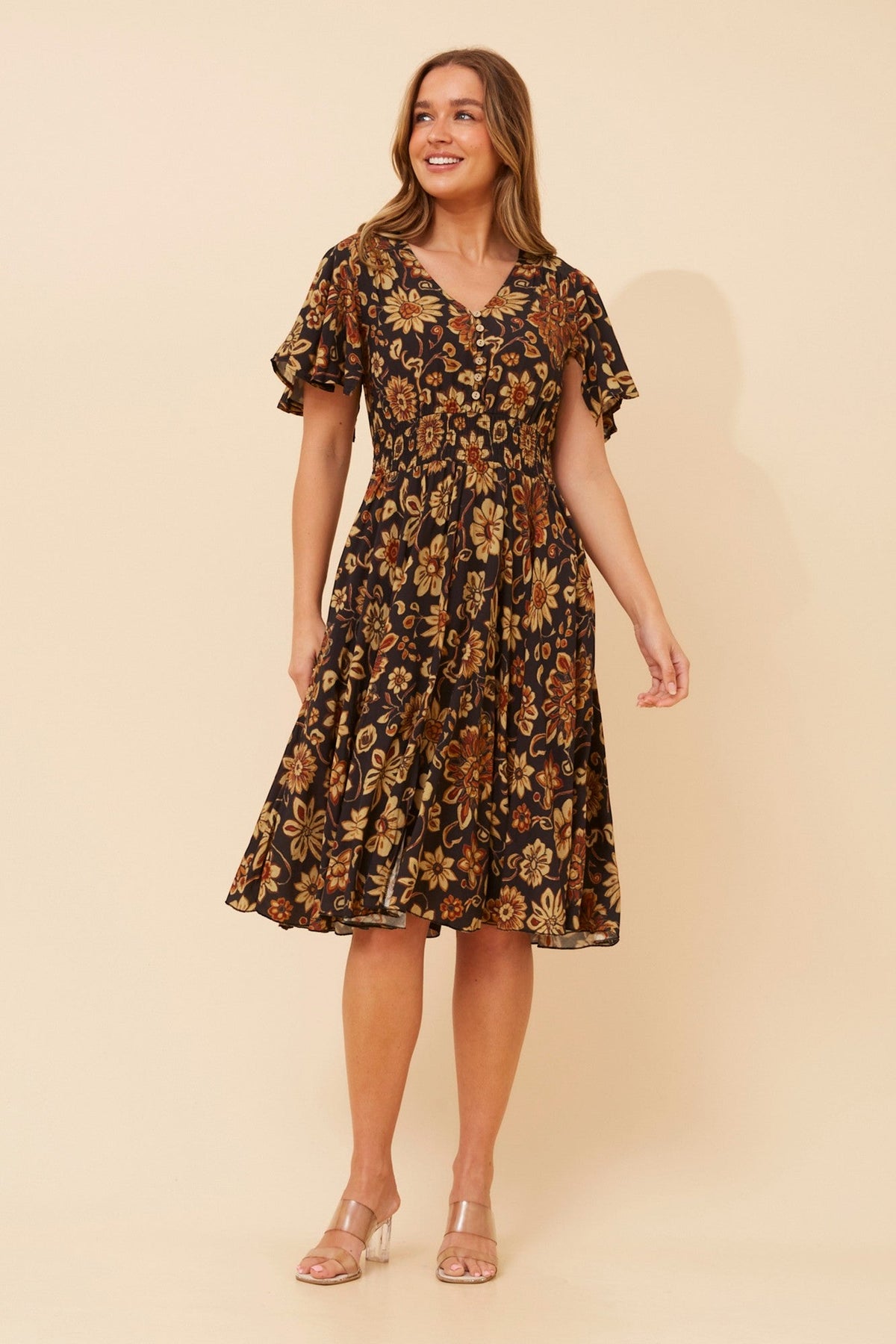 Image of Dresses. Product name - SANDY FLORAL DRESS in Black colour by brand - Caroline Morgan Australia