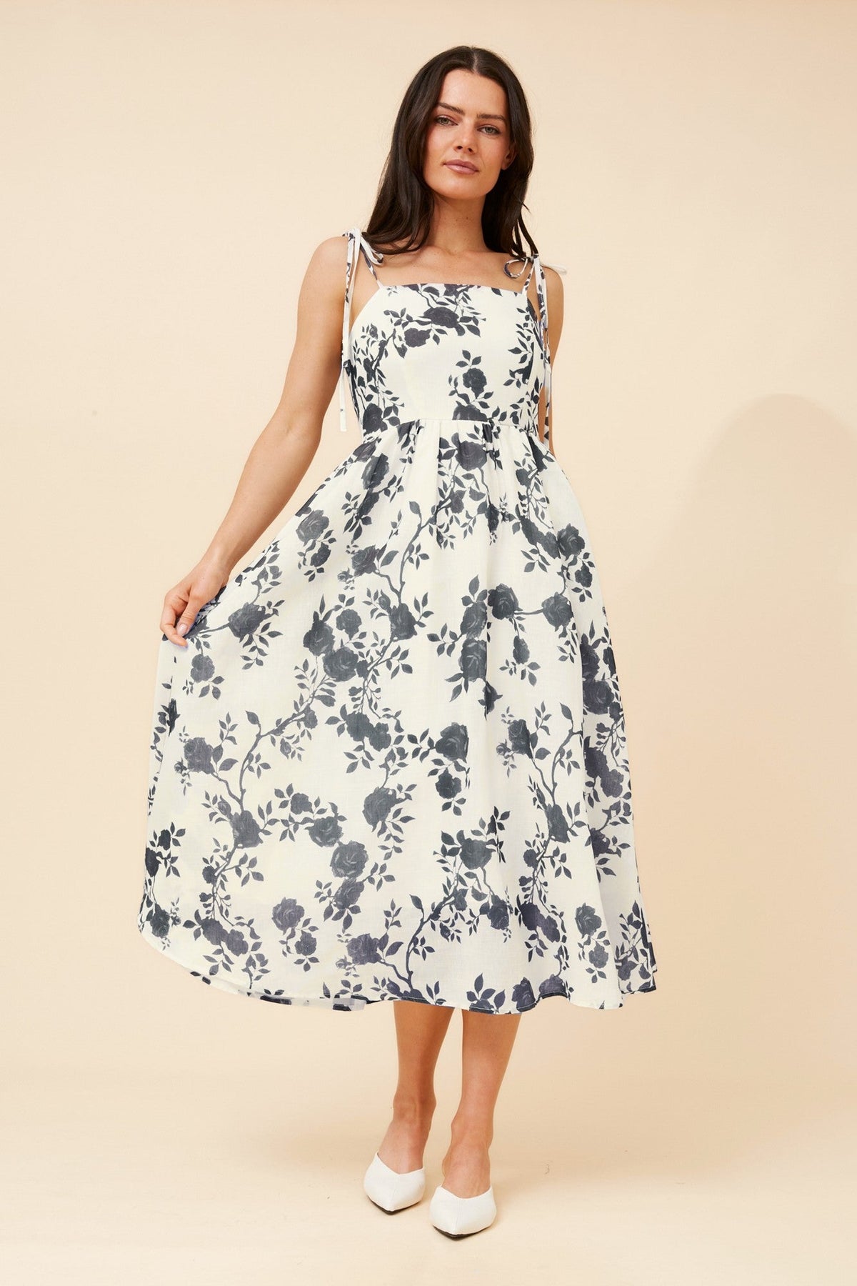 Image of Dresses. Product name - ODELE FLORAL MIDI DRESS in Multi White colour by brand - Caroline Morgan Australia