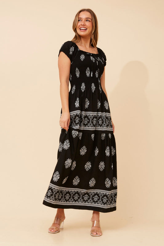 Image of Dresses. Product name - HELINA BORDER PRINT MAXI DRESS in Multi Black colour by brand - Caroline Morgan Australia