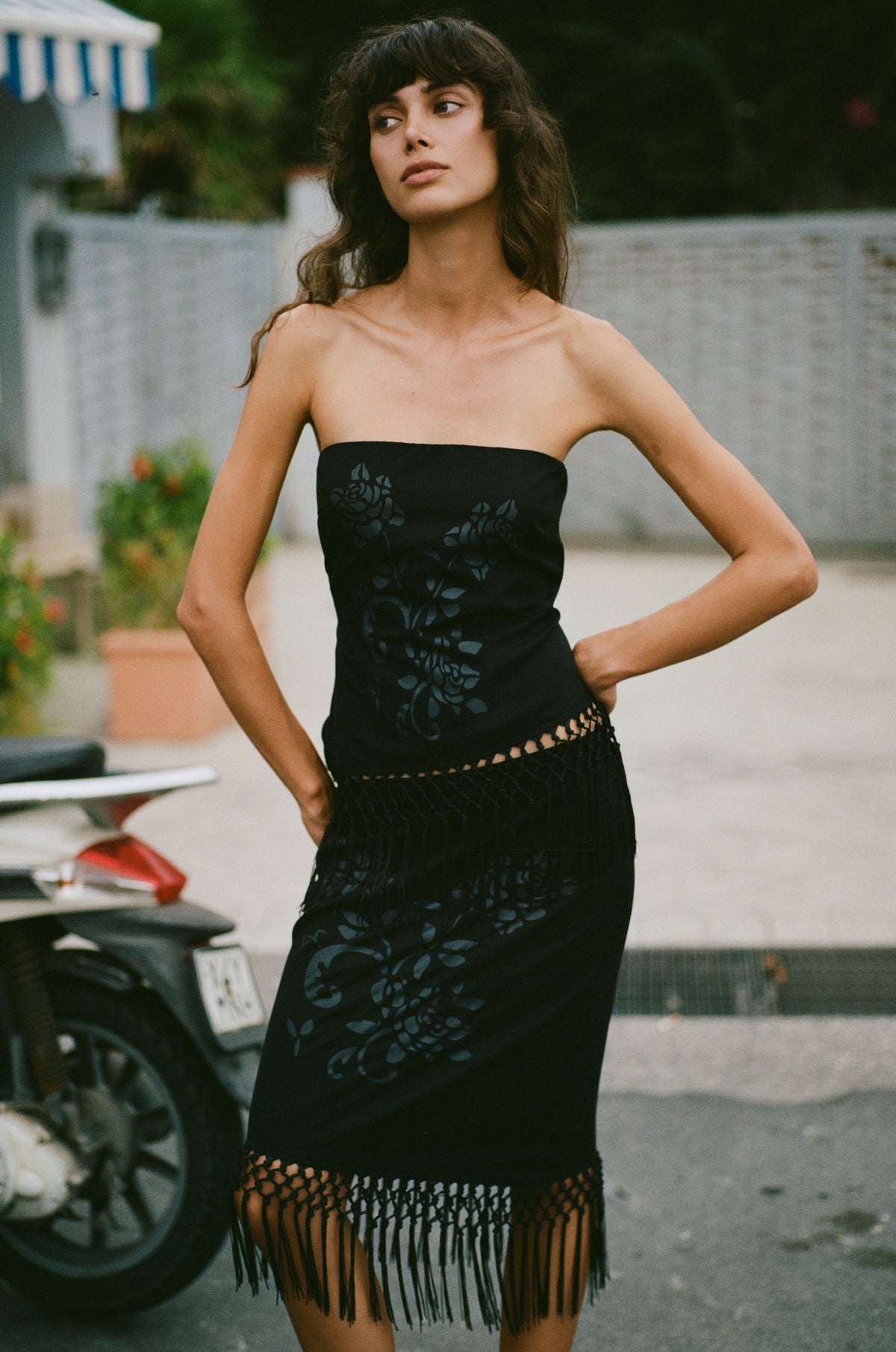Image of a model wearing Skirts. Product name - Daria Skirt in Black colour by brand - With Jéan