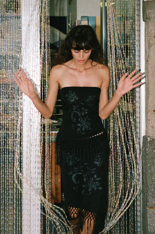 Image of a model wearing Tops. Product name - Daria Top in Black colour by brand - With Jéan