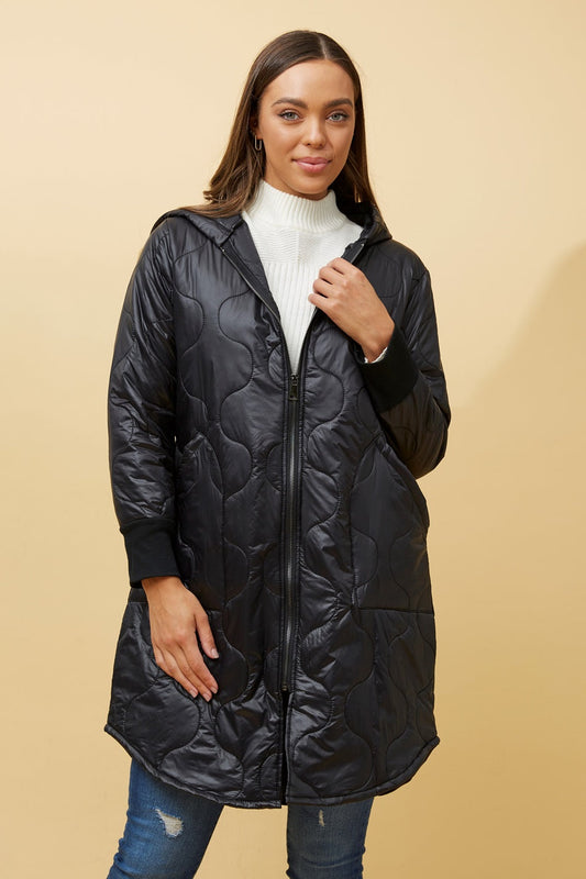 Image of a model wearing Outerwear. Product name - LYRA HOODED PUFFER COAT in Black colour by brand - BOTTEGA MODA
