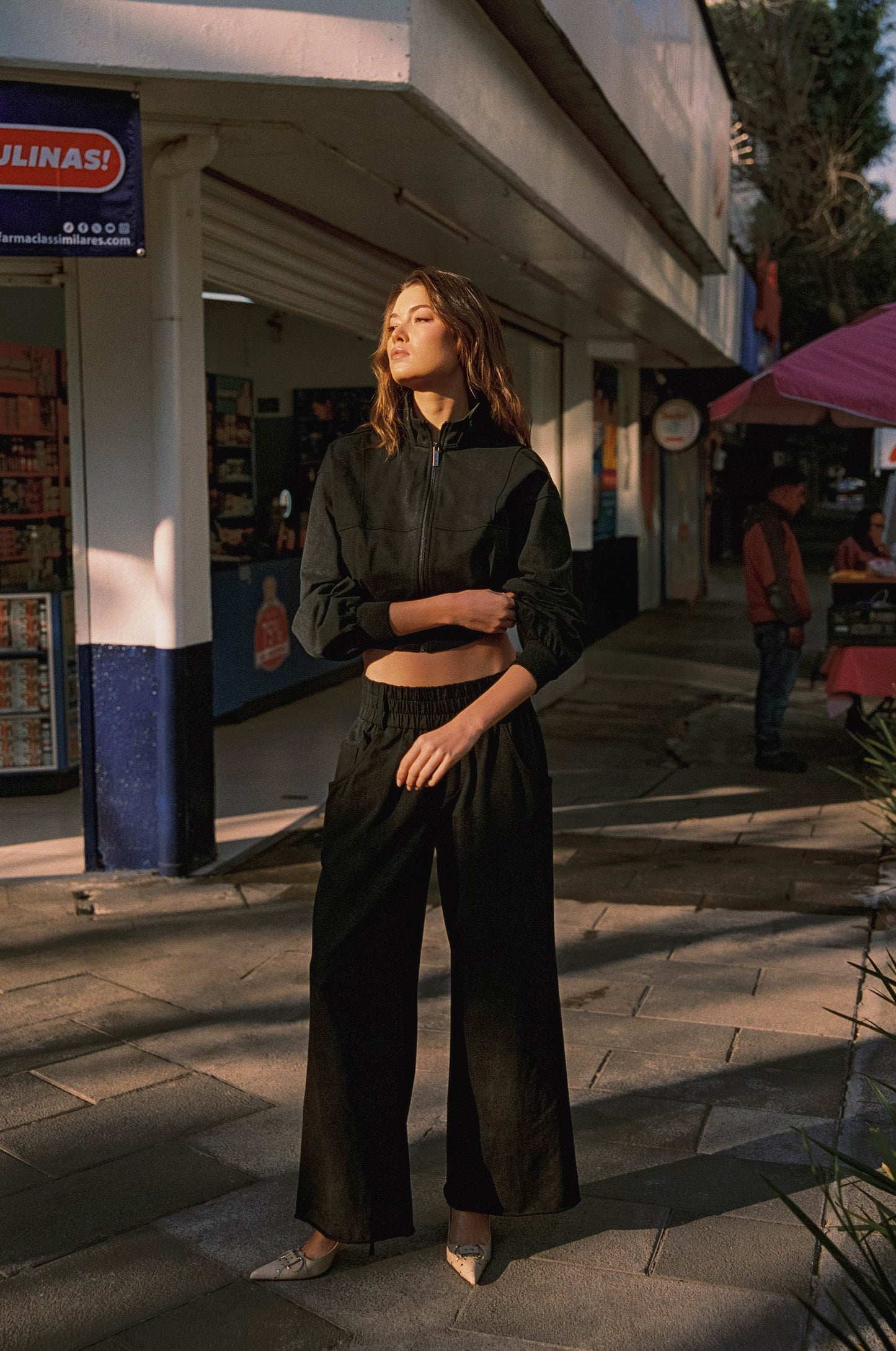 Image of a model wearing Pants. Product name - Eddy Track Pant in Graphite colour by brand - With Jéan