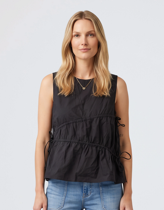 Image of a model wearing Tops. Product name - Elin Gathered Tie Top Black in Black colour by brand - Sass Clothing
