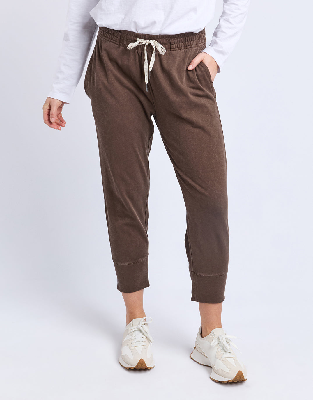 Image of a model wearing Pants. Product name - 3/4 Brunch Pant Coffee in Coffee colour by brand - Elm