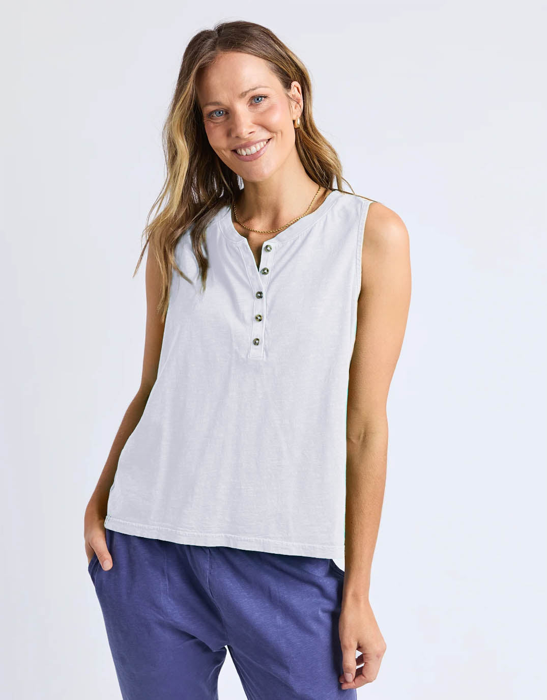 Image of a model wearing Tops. Productname: Elysian Tank - in White colour by brand - Elm