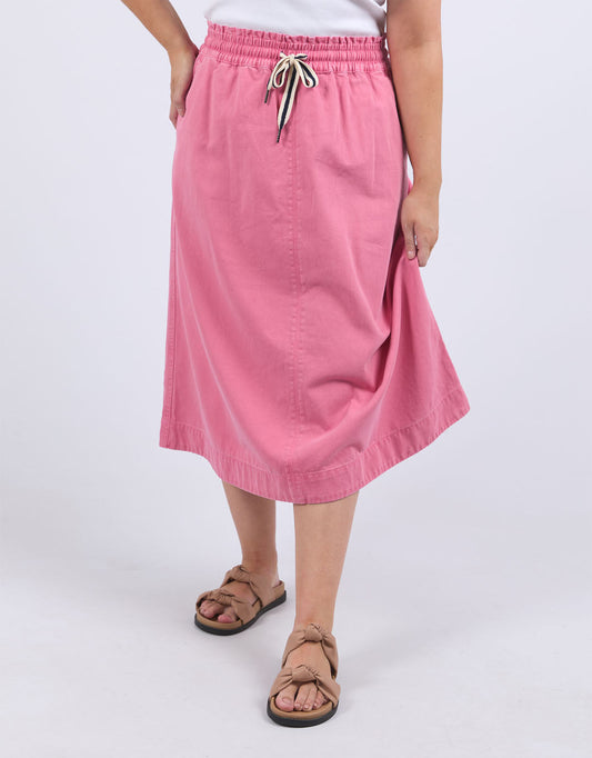 Image of a model wearing Skirts. Productname: Greta Skirt - in Chateau Rose colour by brand - Elm