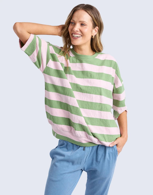 Image of a model wearing Tops. Productname: Mazie Block Stripe Sweat - in Forest Green & Pink Lady Stripe colour by brand - Elm