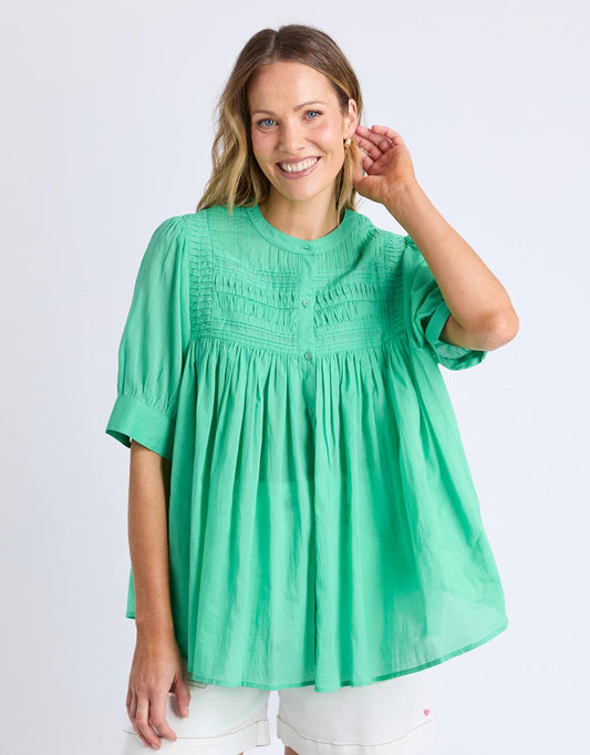 Image of a model wearing Tops. Productname: Monty Short Sleeve Shirt - in Gumdrop Green colour by brand - Elm