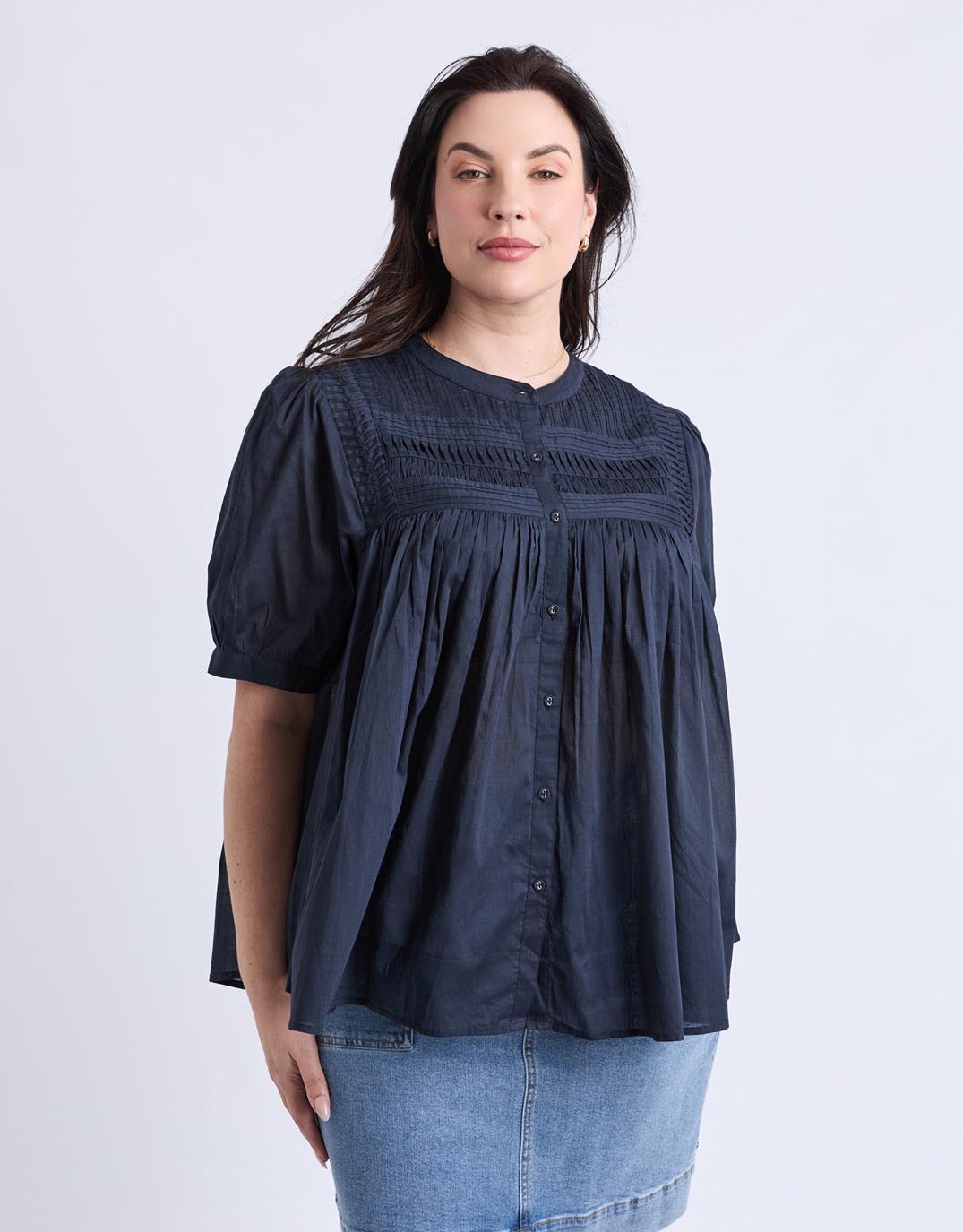 Image of a model wearing Tops. Productname: Monty Short Sleeve Shirt - in Navy colour by brand - Elm