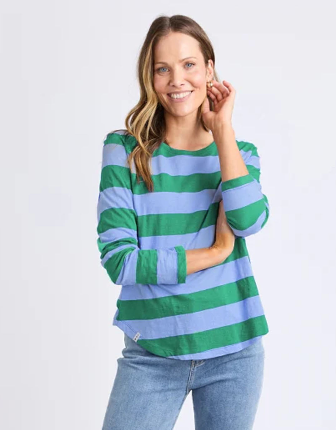 Image of a model wearing Pants. Productname: Spritz Stripe Long Sleeve Tee - in Turquoise/Light Blue Stripe colour by brand - Elm