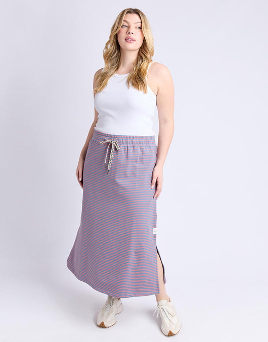 Image of a model wearing Skirts. Productname: Travel Skirt - in Blue Shadow & Sugar Coral Stripe colour by brand - Elm