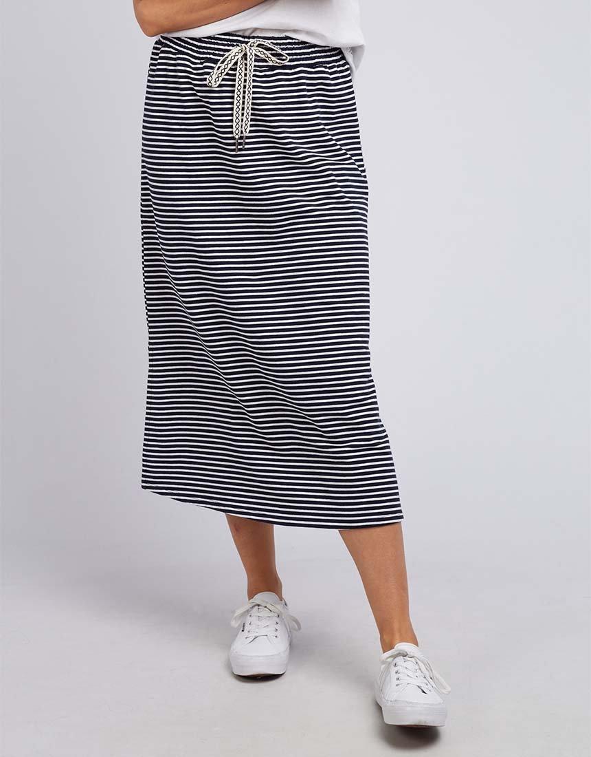 Image of a model wearing Skirts. Productname: Travel Skirt - in Navy/White Stripe colour by brand - Elm