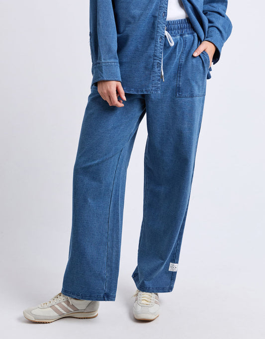 Image of a model wearing Pants. Product name - Valerie Trackpant Blue Denim Look in Blue Denim Look colour by brand - Elm