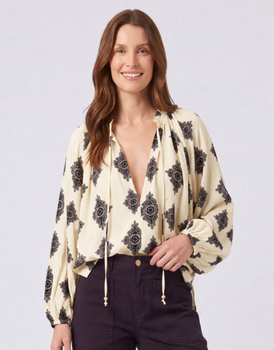 Image of a model wearing Tops. Product name - Estelle Mosaic Blouse Natural/Black in Natural/Black colour by brand - 132 Fashion