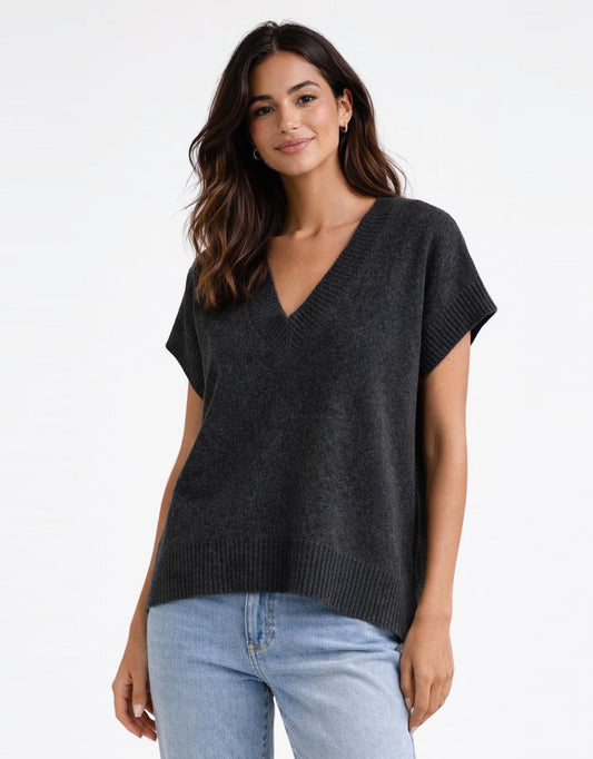 Image of a model wearing Outerwear. Productname: Rae V Neck Vest - in Black Marle colour by brand - Fate and Becker