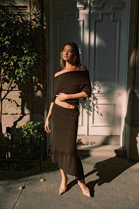 Image of a model wearing Skirts. Product name - Fia Skirt in Chocolate colour by brand - With Jéan