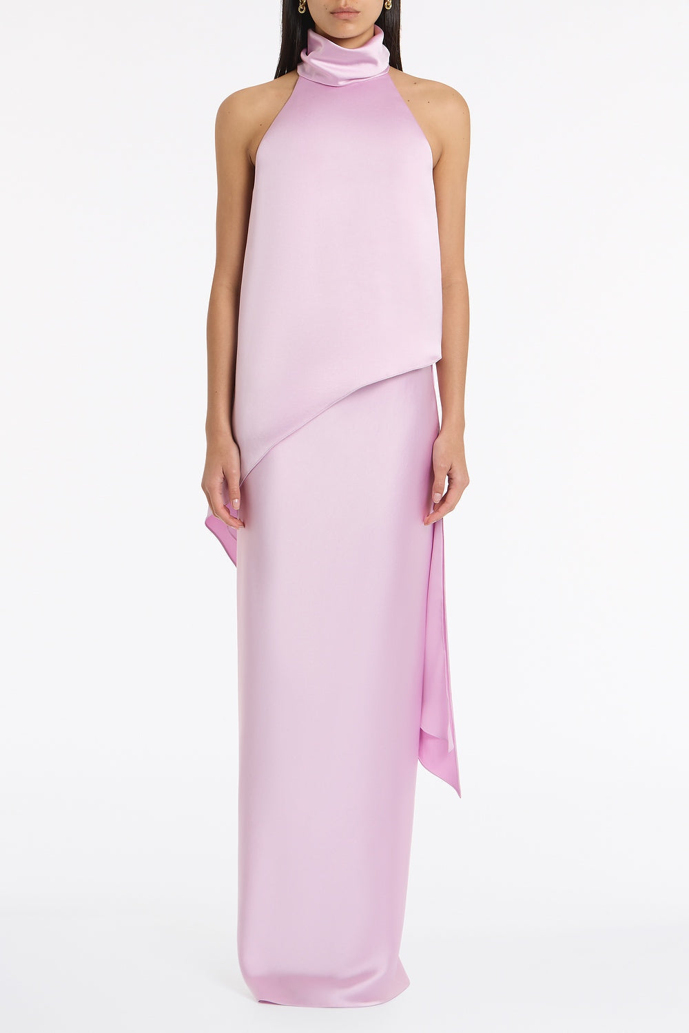 Image of a model wearing Tops. Product name - Floss Lustre Satin Draped Asymmetric Top in Pink colour by brand - Carla Zampatti