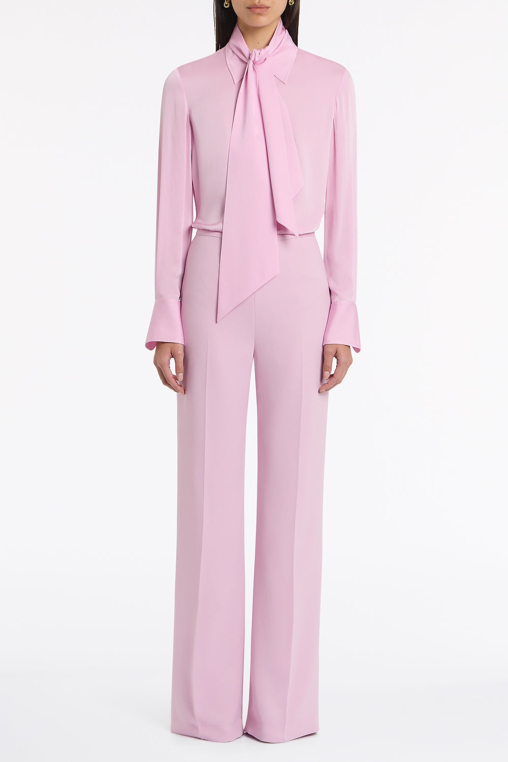 Image of a model wearing Tops. Product name - Floss Silk Satin Georgette Scarf Detail Blouse in Pink colour by brand - Carla Zampatti