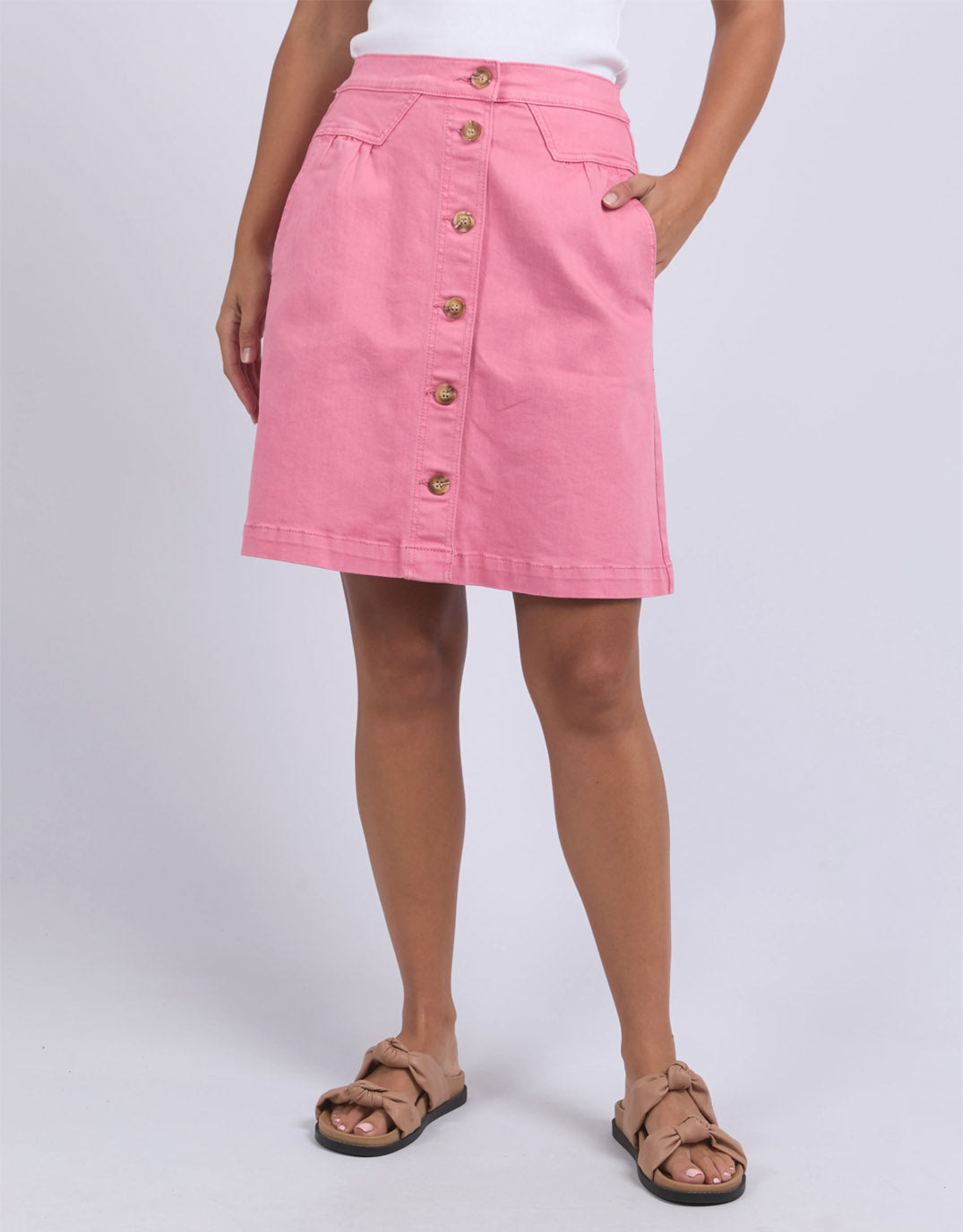 Image of a model wearing Skirts. Productname: Amanda Skirt - in Musk Pink colour by brand - Foxwood