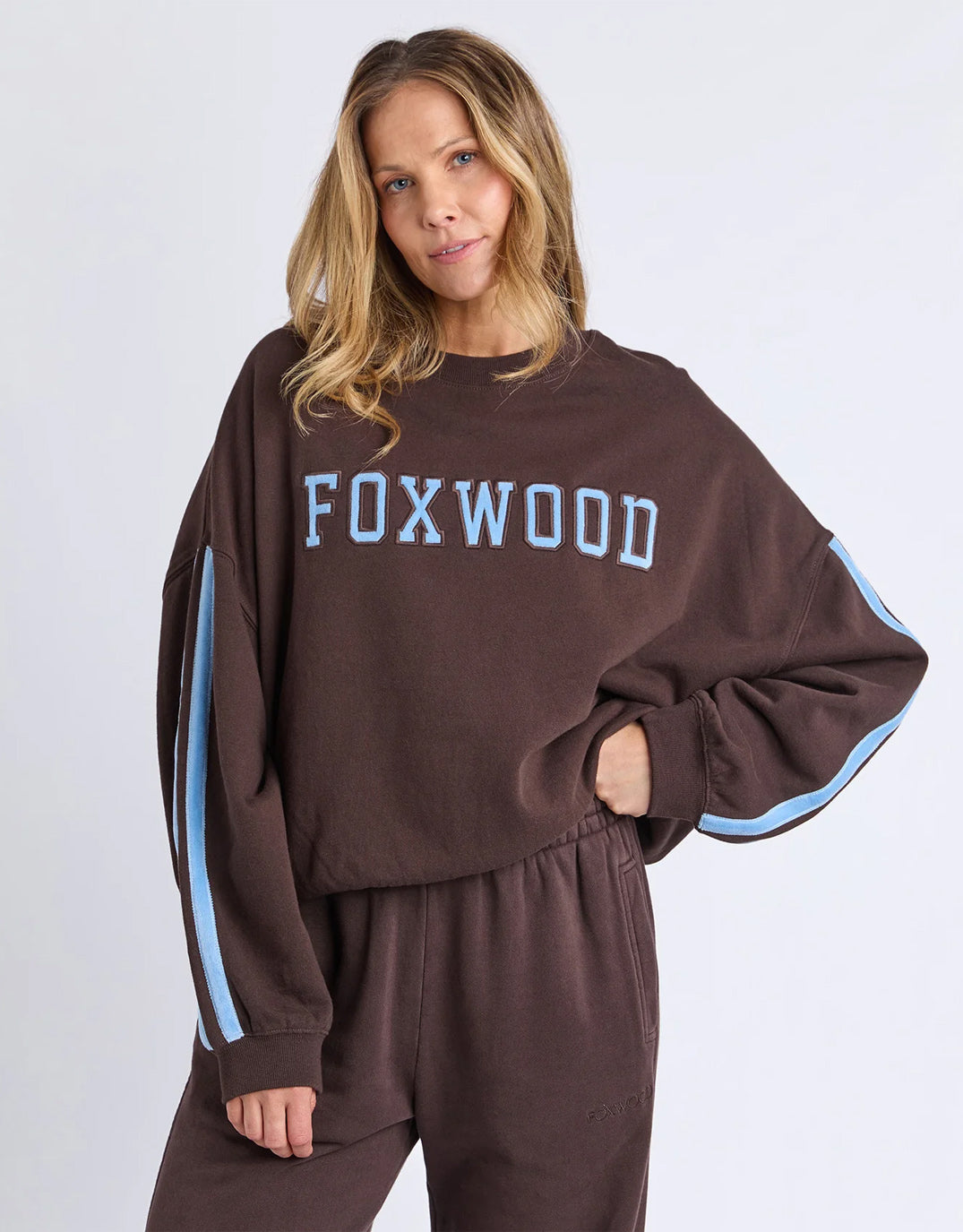 Image of a model wearing Outerwear. Product name - Elevated Sunday Crew Coffee/Light Blue in Coffee/Light Blue colour by brand - Foxwood
