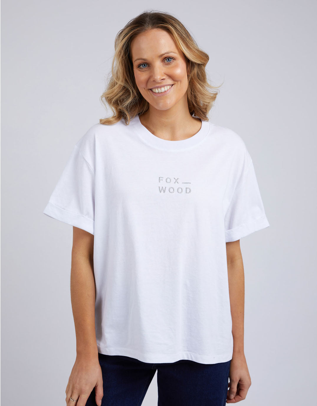 Image of a model wearing Tops. Productname: Huntleigh Oversized Tee - in White colour by brand - Foxwood