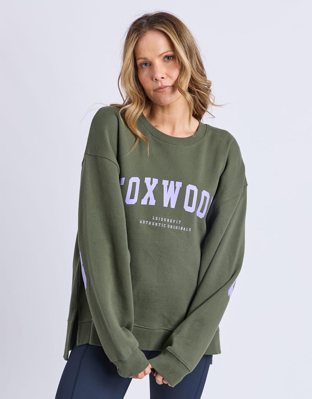 Image of a model wearing Outerwear. Productname: Interval Crew - in Khaki With Lilac colour by brand - Foxwood