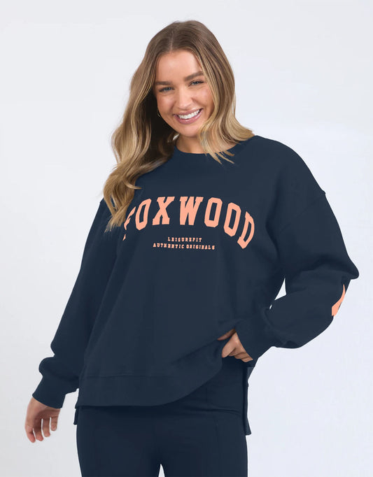 Image of a model wearing Outerwear. Productname: Interval Crew - in Navy With Peach colour by brand - Foxwood