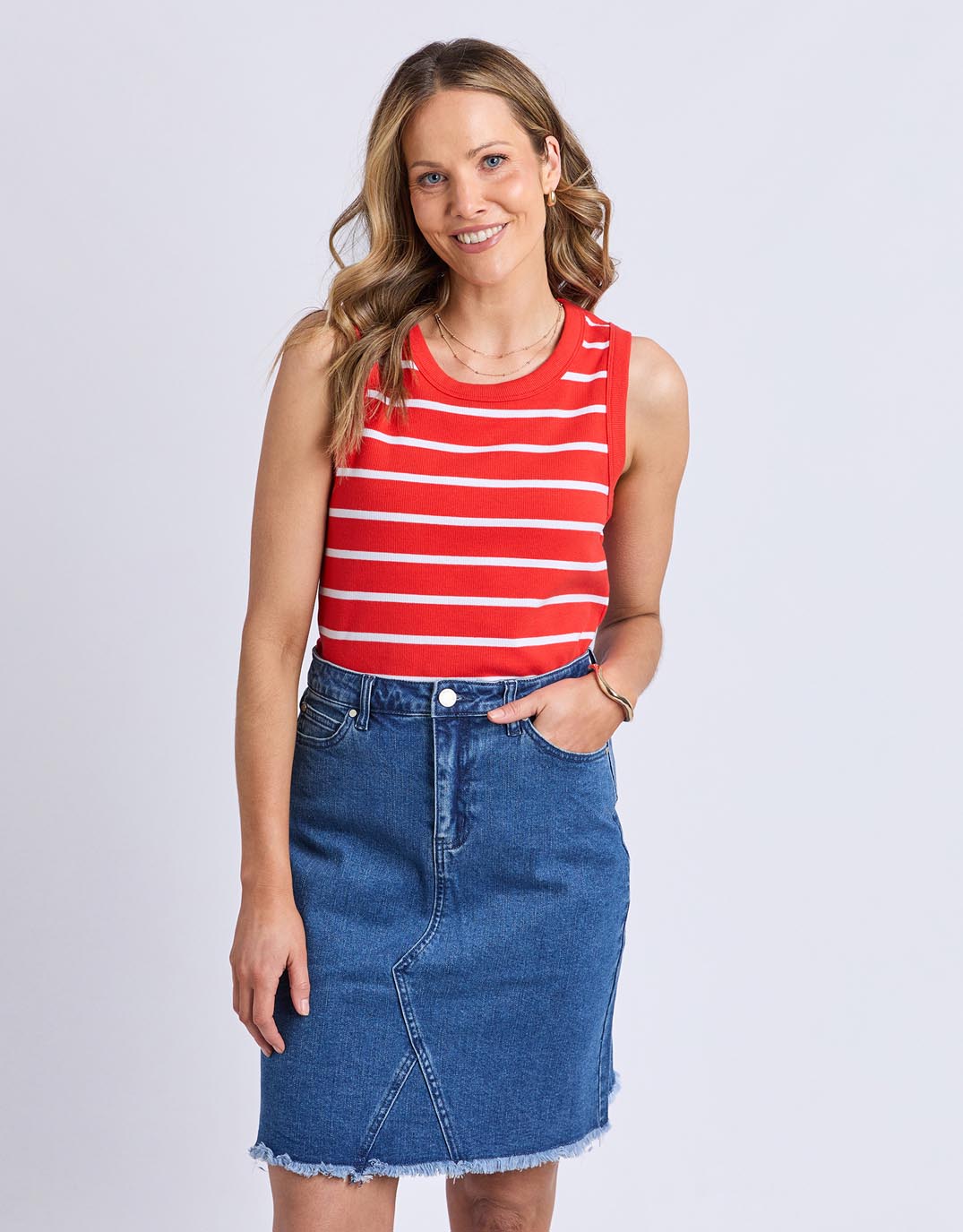 Image of a model wearing Tops. Productname: Iris Stripe Tank - in Tangelo / White Stripe colour by brand - Foxwood