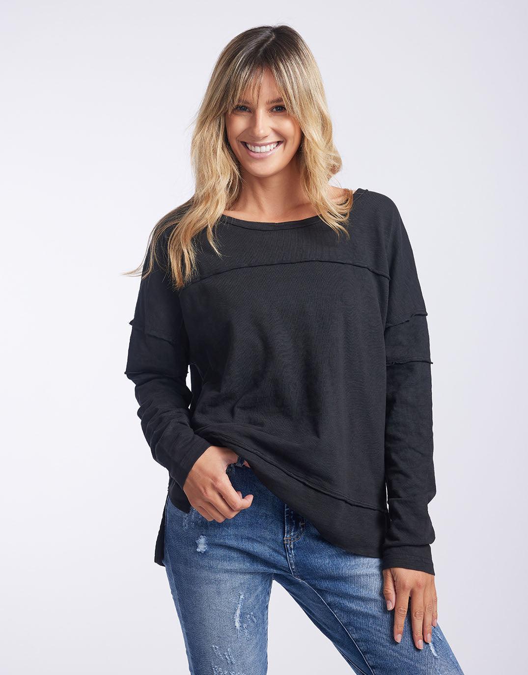 Image of a model wearing Tops. Productname: Jayne Throw On Top - in Black colour by brand - Foxwood