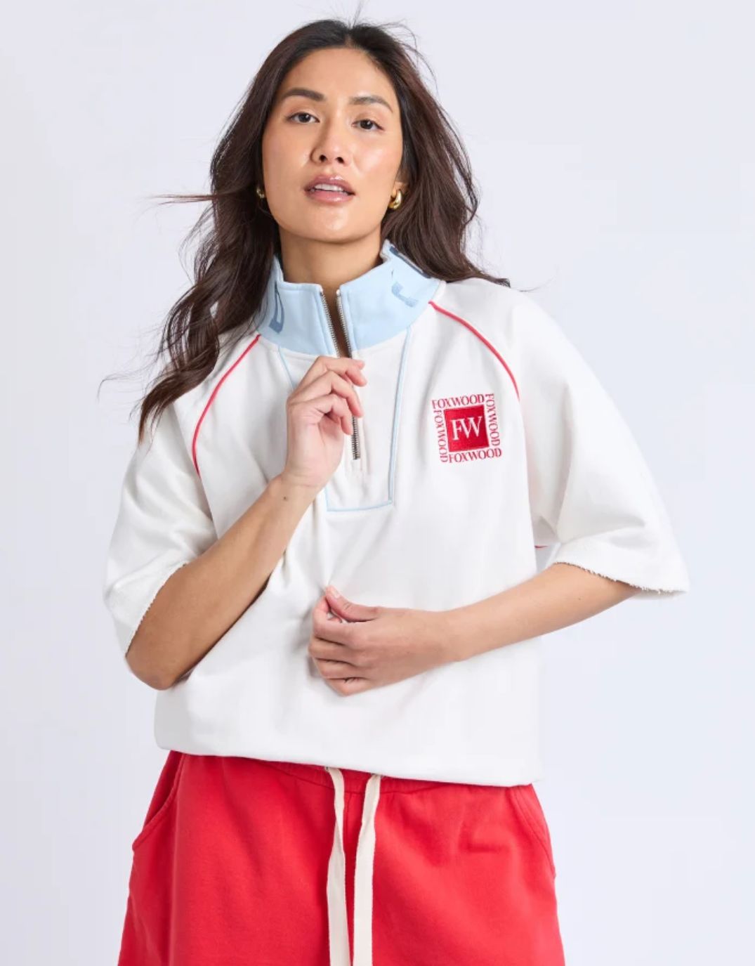 Image of a model wearing Tops. Productname: Piped Zip Crew - in Vintage White colour by brand - Foxwood