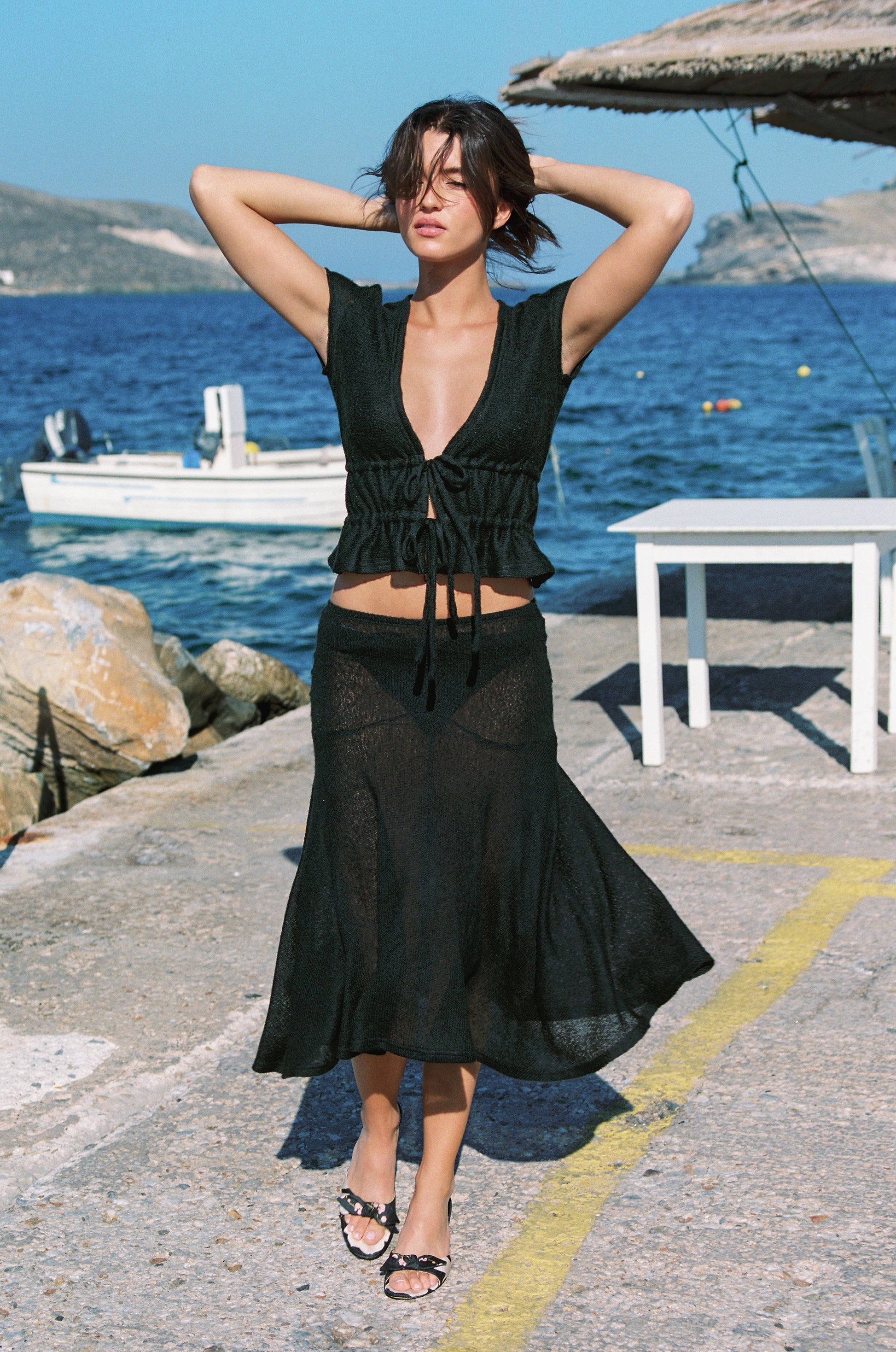 Image of a model wearing Tops. Product name - Francis Top in Black colour by brand - With Jéan