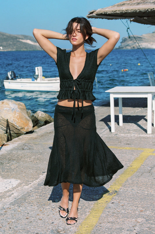 Image of a model wearing Tops. Product name - Francis Top in Black colour by brand - With Jéan