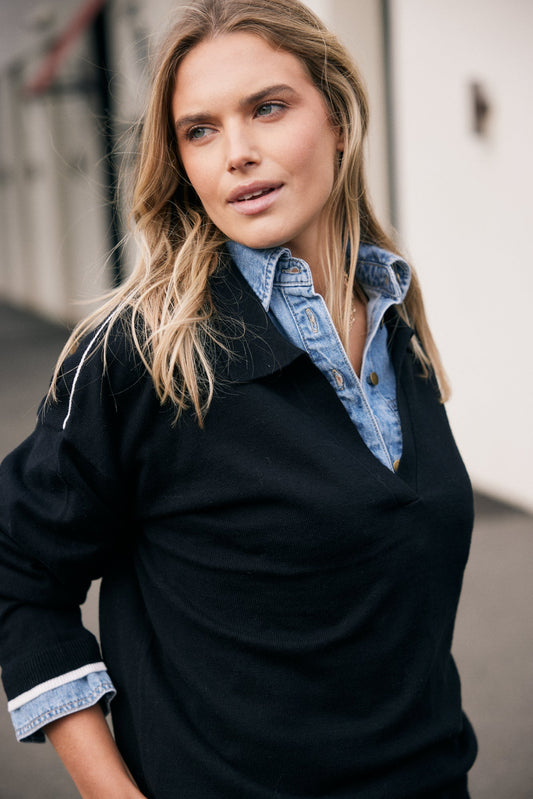 Image of a model wearing Outerwear. Product name - Polo Frenchie Knit Black in Black colour by brand - White & Co.