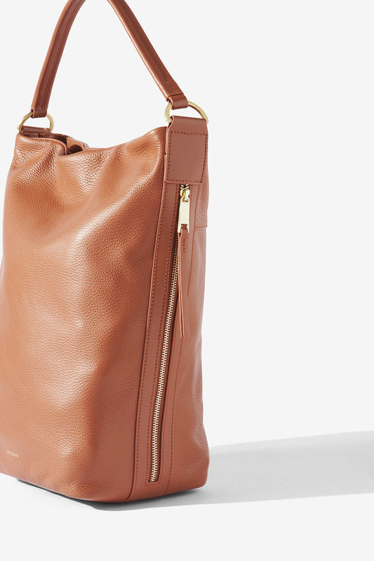 Image of Bags. Product name - GINNI BUCKET BAG BUTTERSCOTCH in Butterscotch colour by brand - KINNON