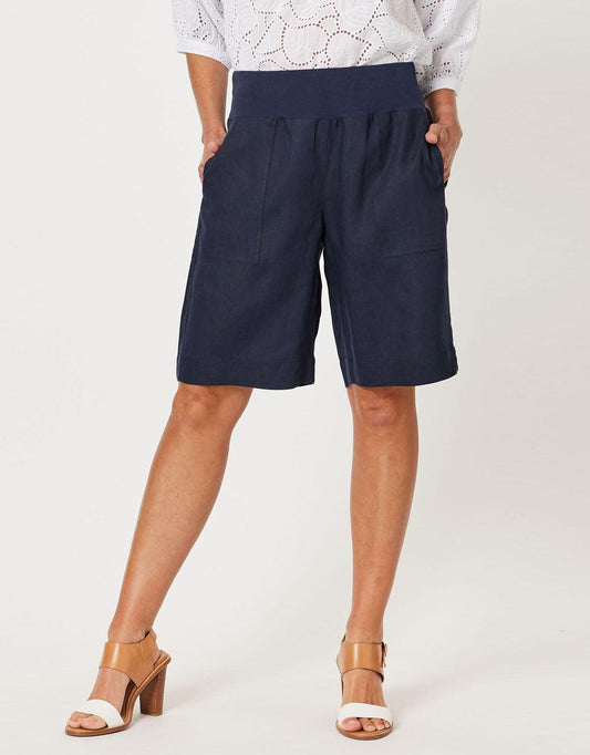 Image of a model wearing Shorts. Productname: Jersey Waist Short - in Navy colour by brand - Gordon Smith