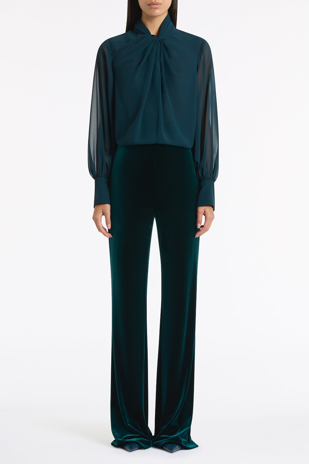 Image of a model wearing Pants. Product name - Hunter Green Velvet Wide Leg Pant in Green colour by brand - Carla Zampatti