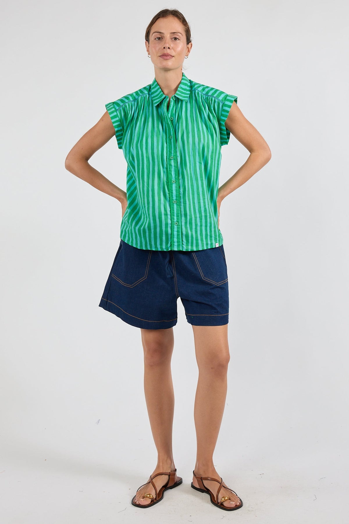 Image of a model wearing Tops. Product name - PRE SALE | IBSA Dixie Top Sea in Sea colour by brand - I.B.S.A