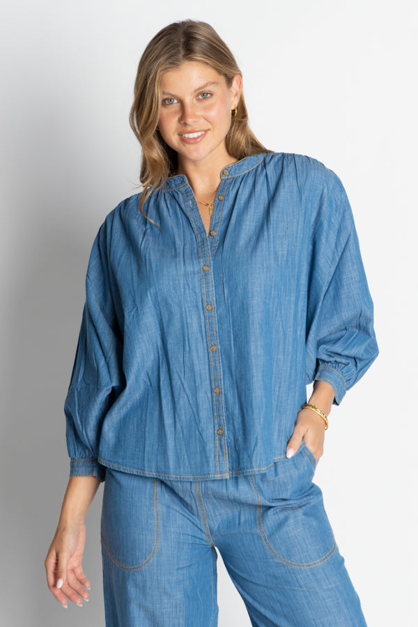 Image of a model wearing Tops. Productname: IBSA Memphis Button Top Light in Light colour by brand - I.B.S.A