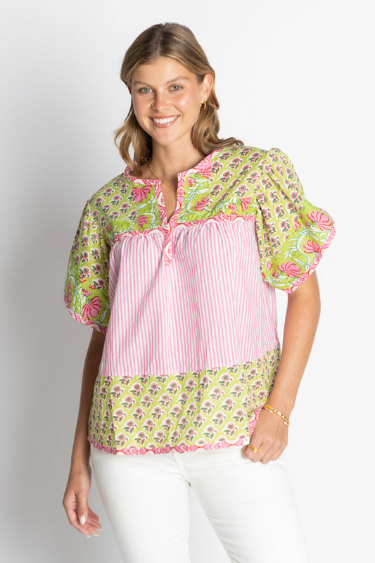 Image of a model wearing Tops. Productname: IBSA Mississippi Ruffle Top Melon in Melon colour by brand - I.B.S.A