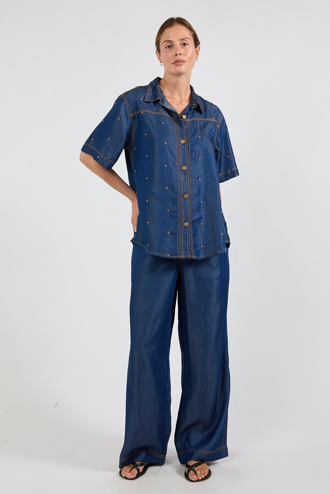 Image of a model wearing Pants. Product name - IBSA River Pant Indigo in Indigo colour by brand - I.B.S.A
