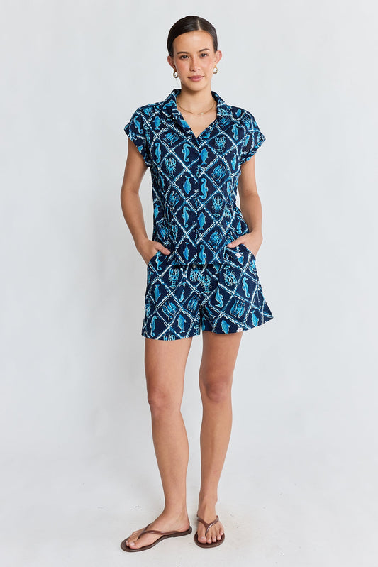 Image of a model wearing Tops. Product name - PRE SALE | IBSA Zeke Top Navy in Navy colour by brand - I.B.S.A