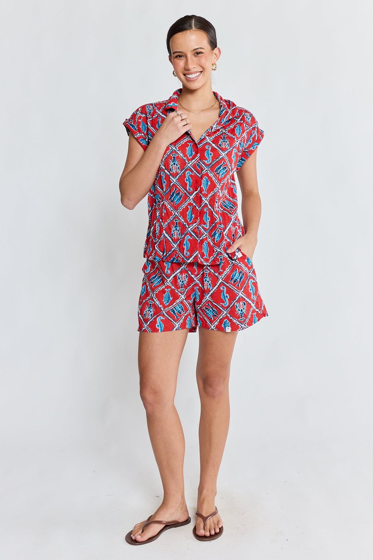 Image of a model wearing Tops. Product name - PRE SALE | IBSA Zeke Top Red in Red colour by brand - I.B.S.A