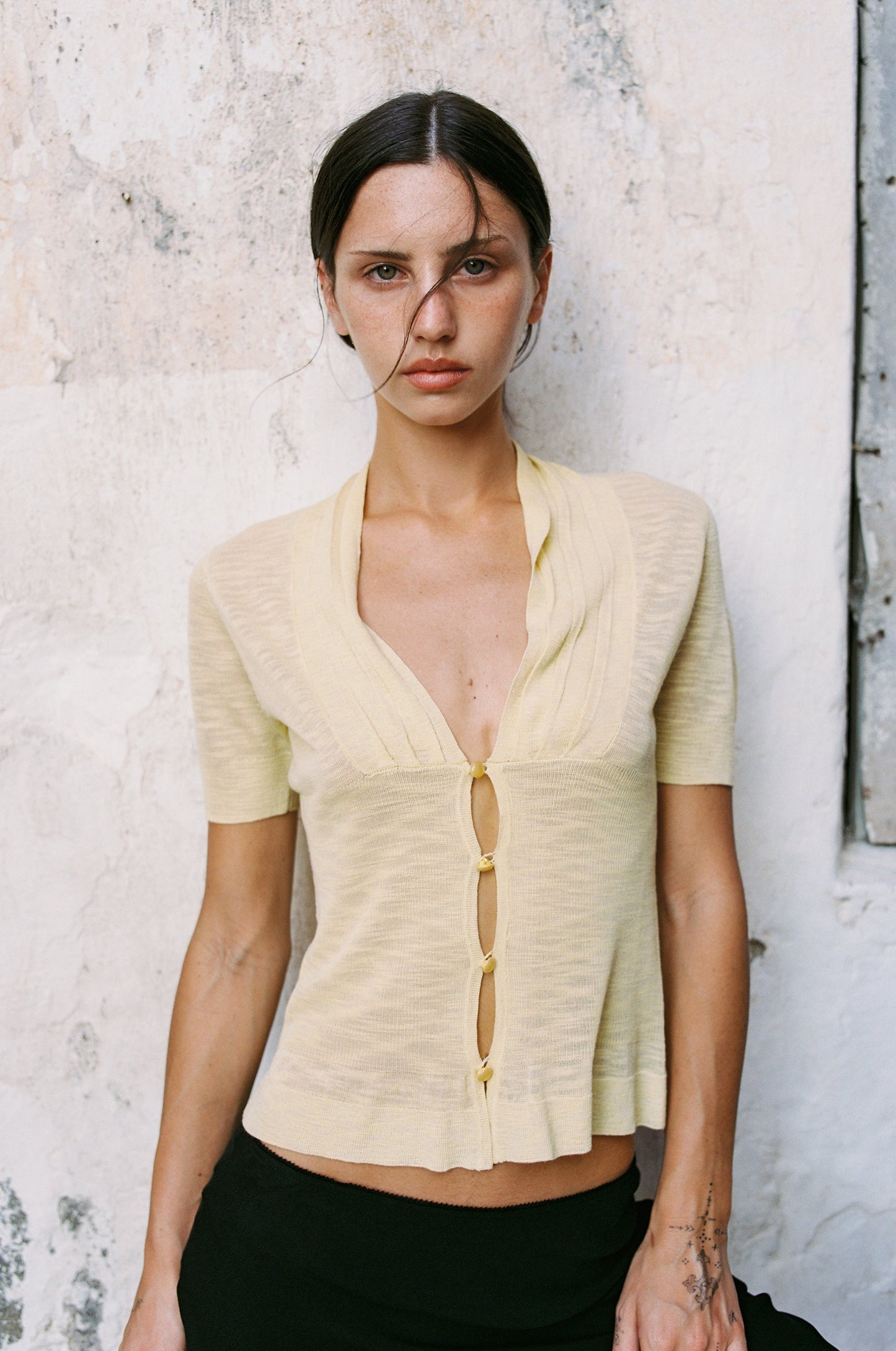 Image of a model wearing Tops. Product name - Ilio Top in Yellow colour by brand - With Jéan