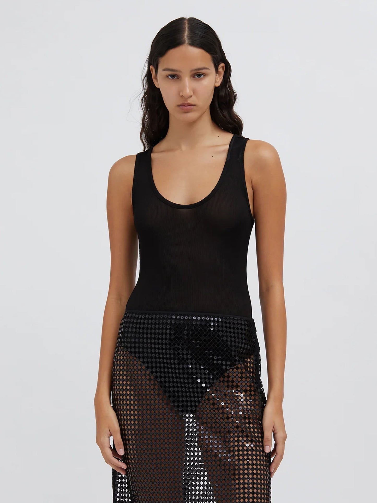 Image of a model wearing Tops. Productname: Christopher Esber Sonora Tank Bodysuit in Black colour by brand - Christopher Esber